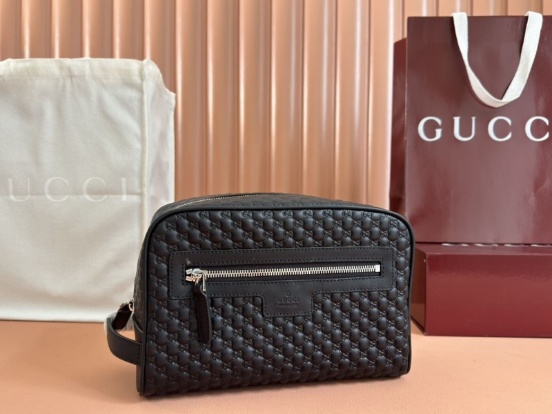 G*u*i clutch bags